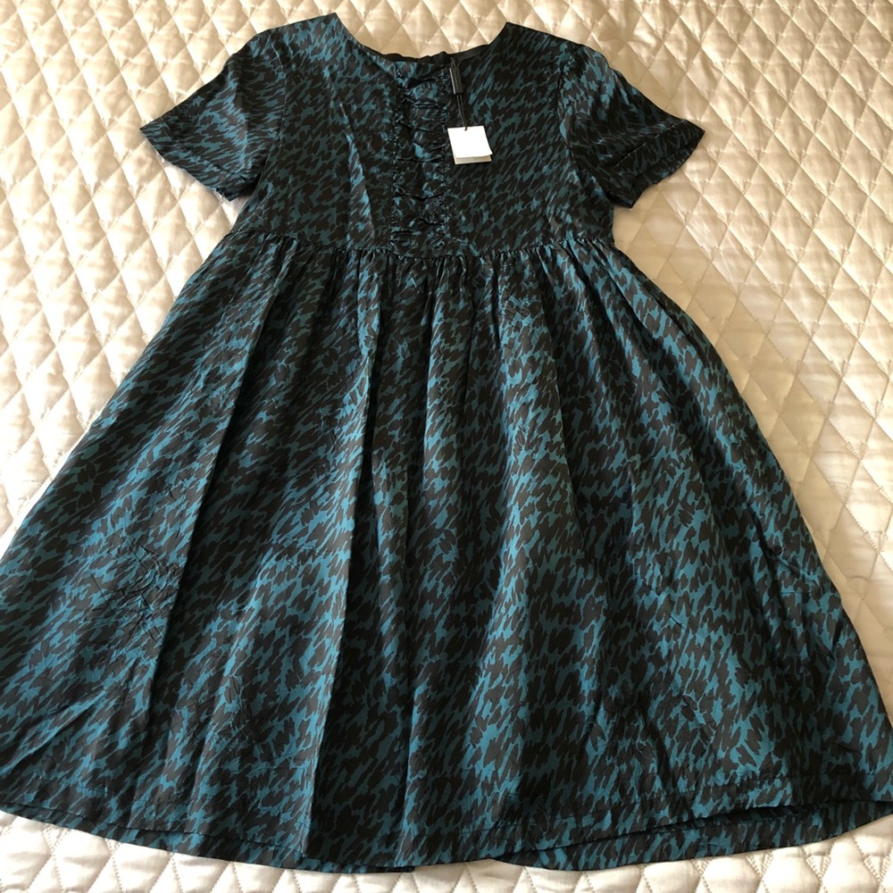 NWT Burberry dress. Will fit adult